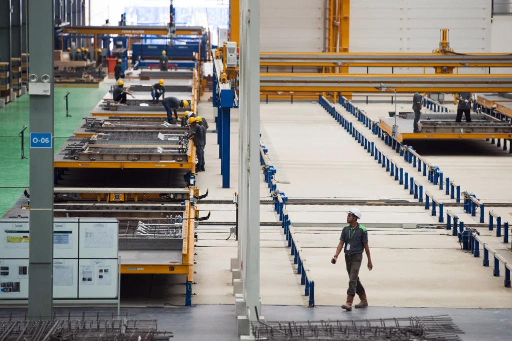Employees work inside a facility in Johor Bahru, Johor, Malaysia. Tan Kah Kee brought industrialisation in Malaya to a level that took many decades to replicate. Photo: Bloomberg